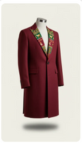 Deep crimson wool overcoat with ornate green and gold embroidered lapels, displayed on a mannequin against a white background